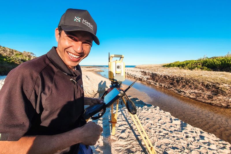A Metiri surveyor on the roadside of a new estate