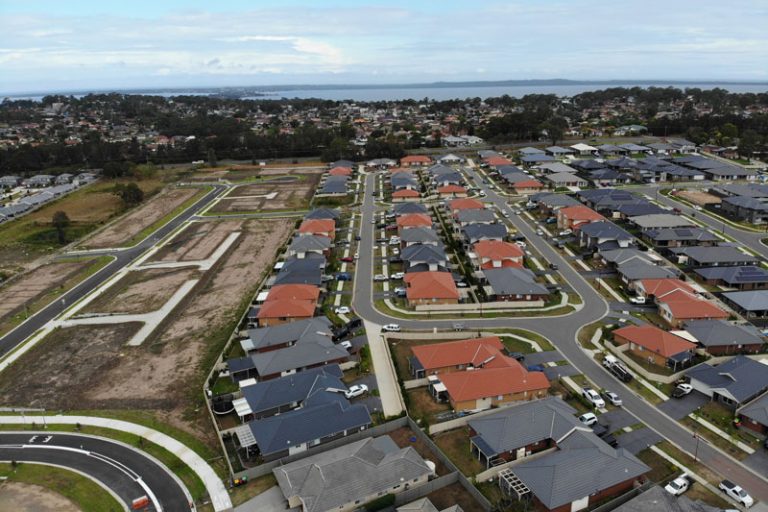 Aerial view of a new residential estate with roads and drainage